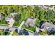 Stunning aerial view of a well-maintained suburban home with a manicured lawn, mature trees, and driveway parking at 16890 Catkins Ct, Westfield, IN 46074