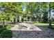 Spacious backyard featuring brick paver patio with inviting fire pit and comfortable outdoor seating at 16890 Catkins Ct, Westfield, IN 46074