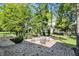Charming backyard featuring a brick paver patio with a fire pit, perfect for relaxing and entertaining guests at 16890 Catkins Ct, Westfield, IN 46074