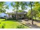 A private backyard area with a brick patio and cozy fire pit, ideal for relaxing and entertaining at 16890 Catkins Ct, Westfield, IN 46074