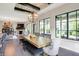 Bright dining area with large windows, hardwood floors and views into the living room at 16890 Catkins Ct, Westfield, IN 46074