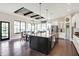 Gourmet kitchen with granite counters, stainless appliances, and open floor plan at 16890 Catkins Ct, Westfield, IN 46074