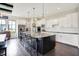 Gourmet kitchen with granite counters, stainless appliances, and breakfast bar at 16890 Catkins Ct, Westfield, IN 46074