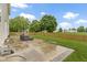 Paver patio boasts an outdoor seating area and a well-maintained lawn, perfect for relaxation and entertainment at 18711 Crestline Ct, Noblesville, IN 46060