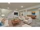 Finished basement featuring neutral paint, a pool table, a sofa, and two armchairs with wood accents at 18711 Crestline Ct, Noblesville, IN 46060