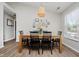 Cozy dining area with modern table and chairs under a unique pendant light at 18760 Pilot Mills Dr, Noblesville, IN 46062