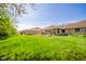 Expansive backyard view showcasing well-maintained lawn and inviting outdoor living areas at 188 Bay Ridge Dr, Pendleton, IN 46064