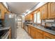 Well-maintained kitchen featuring oak cabinets, stainless steel appliances, and ample counter space at 188 Bay Ridge Dr, Pendleton, IN 46064