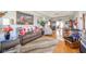 Bright living room with hardwood floors, large painting, and comfortable furnishings at 188 Bay Ridge Dr, Pendleton, IN 46064