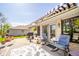 Comfortable patio setup with awning, furniture, grill, rug and pleasant outdoor space at 188 Bay Ridge Dr, Pendleton, IN 46064