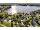 Beautiful aerial shot of lakefront homes surrounded by mature trees and serene lake views at 1940 Stringtown Pike, Cicero, IN 46034