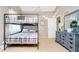 Spacious bedroom with a bunk bed, dresser, and neutral color palette creating a cozy atmosphere at 1940 Stringtown Pike, Cicero, IN 46034