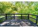 Private deck overlooking lush greenery, perfect for outdoor relaxation and enjoyment at 1940 Stringtown Pike, Cicero, IN 46034