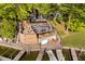 Multi-tiered deck leading to the lake and docks, perfect for lakeside living and entertaining at 1940 Stringtown Pike, Cicero, IN 46034