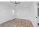 Bright bedroom features new flooring, closet, and natural light at 2302 S Pennsylvania St, Indianapolis, IN 46225