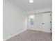 Bedroom with a single window and carpet at 2302 S Pennsylvania St, Indianapolis, IN 46225