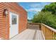 Balcony of home featuring wood decking, siding, and railings with a beautiful view at 2302 S Pennsylvania St, Indianapolis, IN 46225