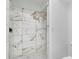 Elegant shower featuring modern tile and fixtures, with a tiled shower floor at 2302 S Pennsylvania St, Indianapolis, IN 46225