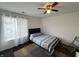 Bright bedroom features ceiling fan, natural light, and modern finishes at 240 Legends Creek Pl # Apt 310, Indianapolis, IN 46229