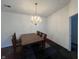 Dining area featuring a chandelier and views of other living area at 240 Legends Creek Pl # Apt 310, Indianapolis, IN 46229