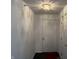 Bright entryway featuring a white front door, overhead lighting and white walls at 240 Legends Creek Pl # Apt 310, Indianapolis, IN 46229