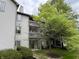 Inviting multi-story condo featuring well-maintained landscaping and private balconies for relaxing outdoors at 240 Legends Creek Pl # Apt 310, Indianapolis, IN 46229