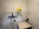 Practical laundry area with shelving and washer hook-up at 240 Legends Creek Pl # Apt 310, Indianapolis, IN 46229