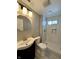 Modern bathroom featuring updated fixtures and glass enclosed shower at 2417 Crystal St, Anderson, IN 46012