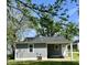 Charming home exterior showcasing gray siding, a new roof, and a welcoming front entrance with covered porch at 2417 Crystal St, Anderson, IN 46012