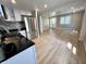 Updated kitchen with granite countertops and stainless steel appliances at 2417 Crystal St, Anderson, IN 46012