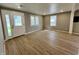 Bright living room featuring new wood-look floors and updated trim at 2417 Crystal St, Anderson, IN 46012