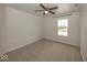 Bright bedroom featuring neutral carpeting, ceiling fan, and natural light at 2780 Cormorant Dr, Greenwood, IN 46143