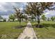 Picturesque community park with walking paths, mature trees, and a central gazebo for residents to enjoy at 2780 Cormorant Dr, Greenwood, IN 46143