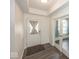 Bright entryway with hardwood floors, a white front door, and glass french doors at 2780 Cormorant Dr, Greenwood, IN 46143