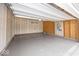 Clean and spacious garage with ample room for parking and storage with painted walls and sealed flooring at 2780 Cormorant Dr, Greenwood, IN 46143