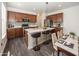 Modern kitchen featuring stainless steel appliances, center island with bar seating, and stylish backsplash at 2780 Cormorant Dr, Greenwood, IN 46143