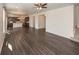 Hardwood floors highlight the seamless layout of the living room and kitchen area at 2780 Cormorant Dr, Greenwood, IN 46143