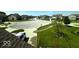 Neighborhood street view of homes in a quiet community showing mature trees and well-kept lawns at 2780 Cormorant Dr, Greenwood, IN 46143