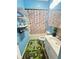 Cozy bathroom with blue walls, a shower with Paris-themed curtain, and a car track rug at 309 N Forest Ave, Indianapolis, IN 46201