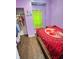 Cozy bedroom with a full-size bed, wood floors, and a closet space, a private retreat perfect for relaxation at 309 N Forest Ave, Indianapolis, IN 46201