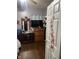 Bedroom with a bed, dresser, shelves, and television at 309 N Forest Ave, Indianapolis, IN 46201