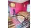 Inviting living room with comfortable seating, a colorful rug, and a cozy atmosphere for relaxation and gatherings at 309 N Forest Ave, Indianapolis, IN 46201