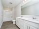 Clean bathroom features a double sink vanity, large mirror, and shower-tub combo at 3256 Fawn Cir, Brownsburg, IN 46112