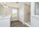 Bathroom showcases a modern vanity, dual sinks, and tiled walk-in shower at 3256 Fawn Cir, Brownsburg, IN 46112