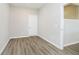 Empty bedroom features hard wood floors, light walls and white trim at 3256 Fawn Cir, Brownsburg, IN 46112