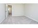 Cozy bedroom with neutral carpet, closet, and open doorway to another room at 3256 Fawn Cir, Brownsburg, IN 46112