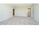 Spacious bedroom featuring carpeting and doorway leading to additional rooms at 3256 Fawn Cir, Brownsburg, IN 46112
