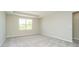 Spacious bedroom with tray ceiling and large window offering natural light at 3256 Fawn Cir, Brownsburg, IN 46112