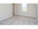 Comfortable bedroom featuring neutral carpet, natural light from the window, and a closet at 3256 Fawn Cir, Brownsburg, IN 46112