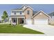 Two-story brick home featuring a two-car garage, landscaped yard, and an 'available' sign at 3256 Fawn Cir, Brownsburg, IN 46112